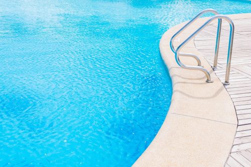 Beautiful luxury outdoor swimming pool in hotel resort - Vintage Light Filter